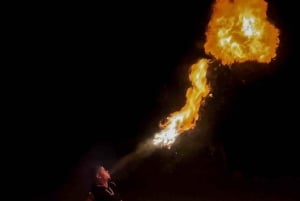 Dîner-spectacle dans le désert et balade à dos de chameau au coucher du soleil