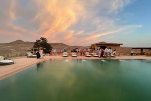 sunset over the Agafay desert, dinner and camel ride.