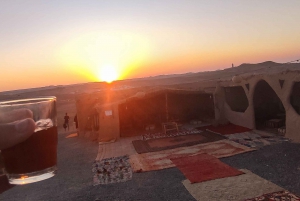 sunset over the Agafay desert, dinner and camel ride.
