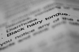 An image referencing the importance of understanding black hairy tongue according to a Korean dentist