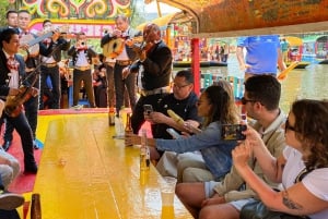 CDMX: Trajinera Party with Drinks, Music, and Tacos.