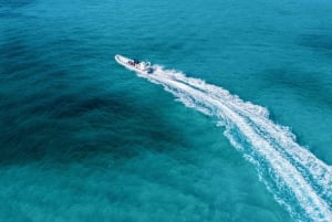 Esnórquel en lancha motora con estrellas de mar y arrecifes tropicales de Cozumel