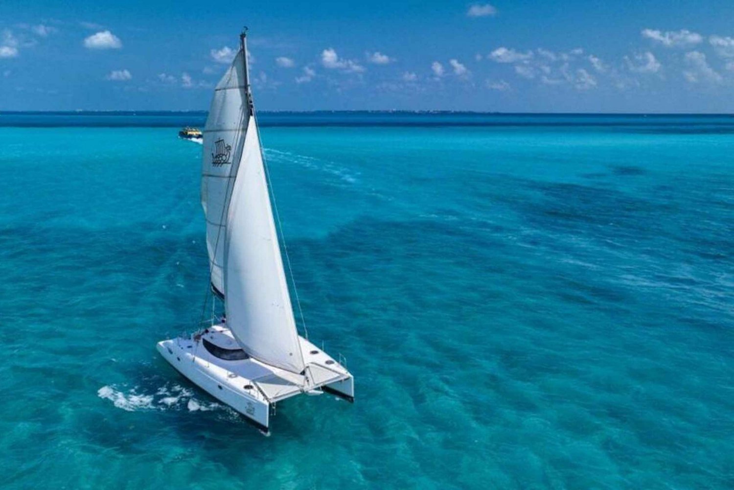 Isla Mujeres Premium Catamaran Tour with Hotel Pickup