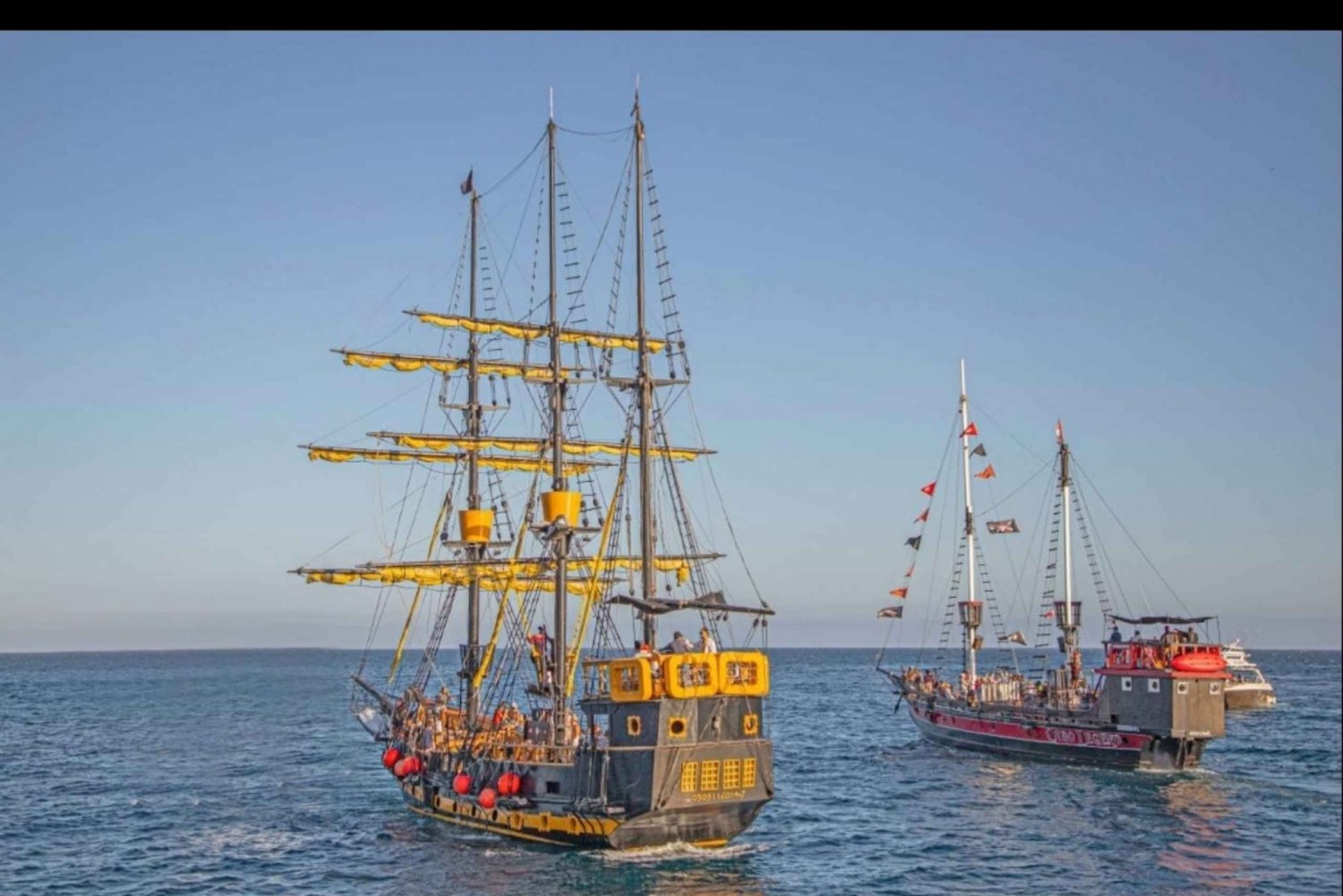 Pirate party boat at sunset