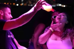 Miami: Booze Cruise Boat Party with DJ, Snacks, & Open Bar