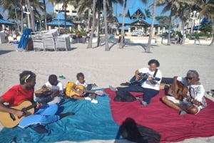 Miami: Gitaarles op het strand