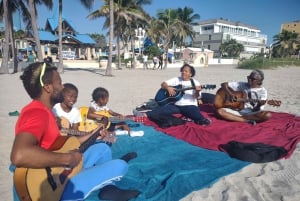 Miami: Gitaarles op het strand