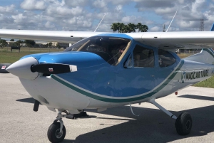 Miami Beach: Tour particular de 50 minutos em um avião de luxo ao pôr do sol