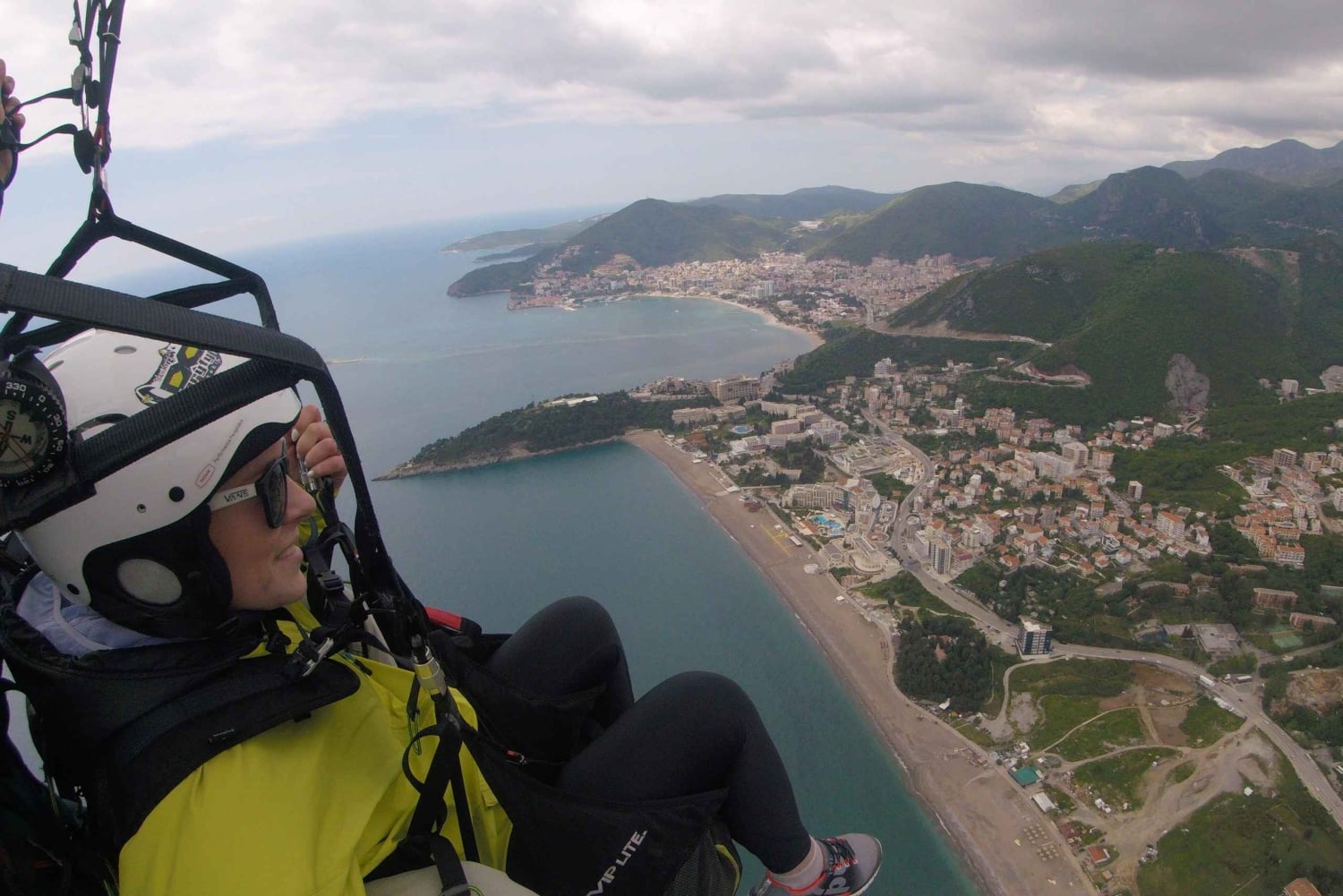 Bečići: Tandem Paragliding Experience with Pickup