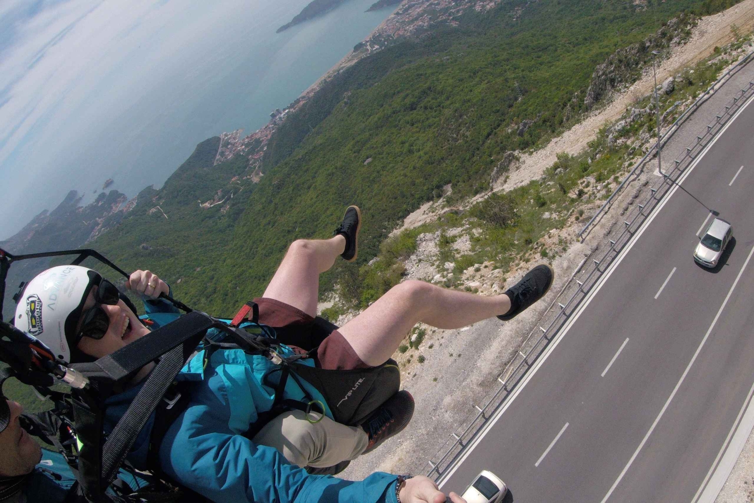 Bečići: Tandem Paragliding Experience with Pickup