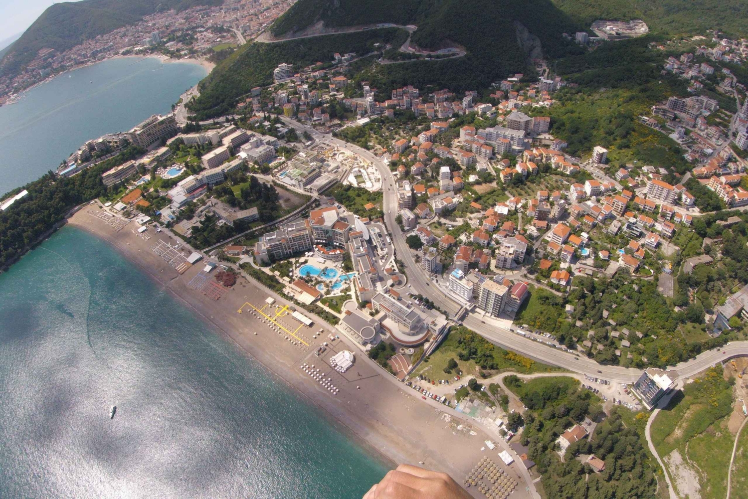 Bečići: Tandem Paragliding Experience with Pickup