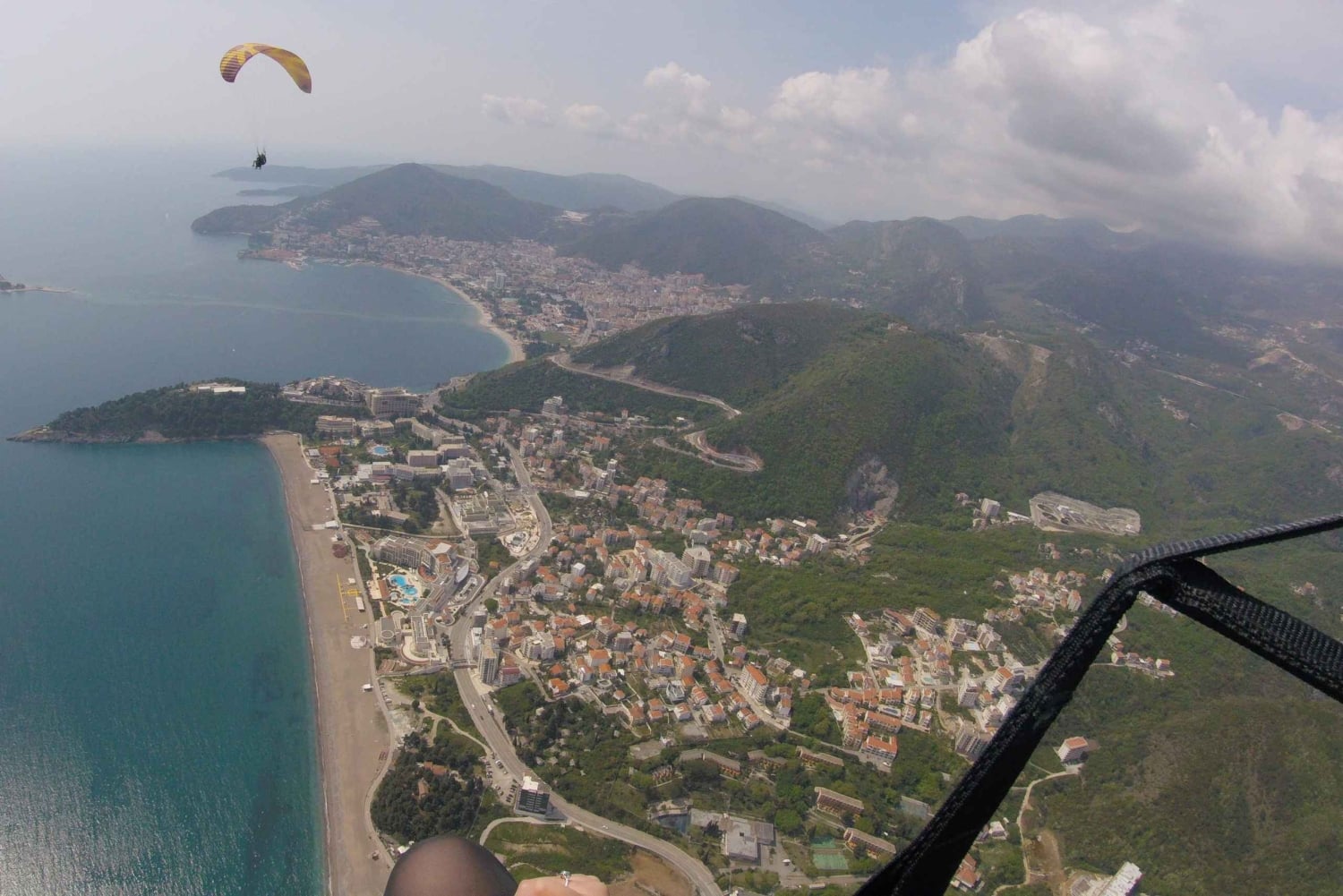 Bečići: Tandem Paragliding Experience with Pickup