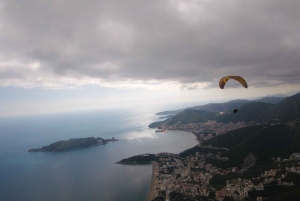 Bečići: Tandem Paragliding Experience with Pickup