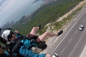 Bečići: Tandem Paragliding Experience with Pickup
