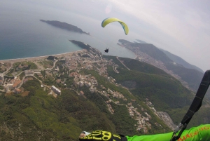 Bečići: Tandem Paragliding Experience with Pickup