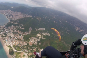 Bečići: Tandem Paragliding Experience with Pickup