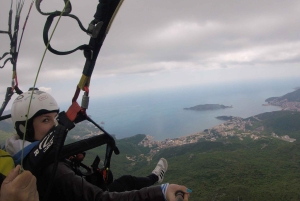 Bečići: Tandem Paragliding Experience with Pickup