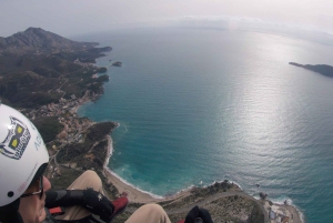 Bečići: Tandem Paragliding Experience with Pickup
