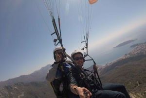 Bečići: Tandem Paragliding Experience with Pickup