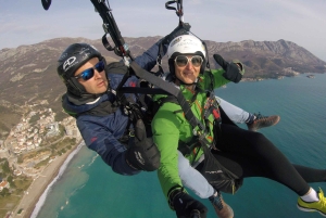 Bečići: Tandem Paragliding Experience with Pickup