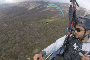 Bečići: Tandem Paragliding Experience with Pickup
