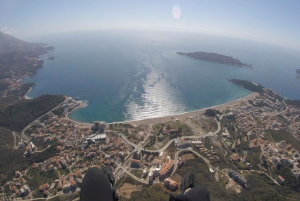 Bečići: Tandem Paragliding Experience with Pickup