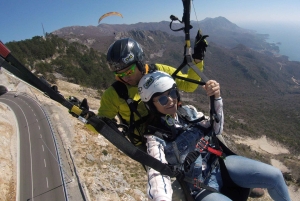 Bečići: Tandem Paragliding Experience with Pickup