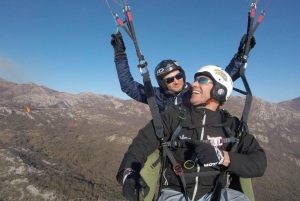 Bečići: Tandem Paragliding Experience with Pickup