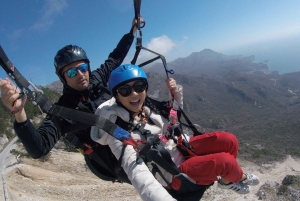 Bečići: Tandem Paragliding Experience with Pickup