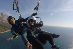 Bečići: Tandem Paragliding Experience with Pickup