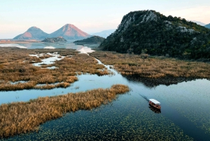 Skadar Lake: Guided Sunset Boat Tour with Wooden Boat & Wine