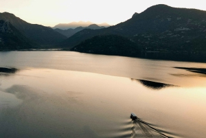 Skadar Lake: Guided Sunset Boat Tour with Wooden Boat & Wine