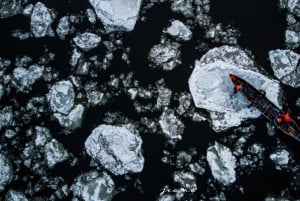 Quebec City: Ice Canoeing with Hot Chocolate & Sauna