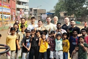 Mumbai:Dharavi Slum, Dhobi Ghat Laundry & Flower market Tour