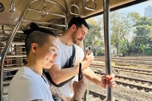 Mumbai: Dharavin slummi ja Dhobi Ghat paikallisjunalla ajellen