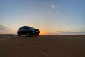 Au départ de Mascate : coucher de soleil sur les sables de Wahiba et dîner au camp du désert