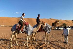 Vanuit Muscat: Wahiba Sands Zonsondergang met Woestijnkamp Diner