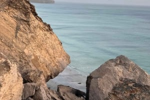 Östra Salalah dag och natt: kameler, vattenfall och souk-tur