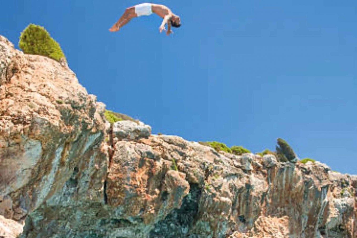 from muscat : cliff jumping adventure in wadi hawer