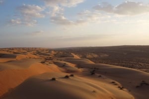 From Muscat: Guided Overnight Desert Camp Tour