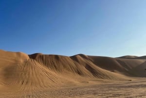 Magia dell'ora d'oro: Tour del tramonto nel deserto di Rub' Al Khali