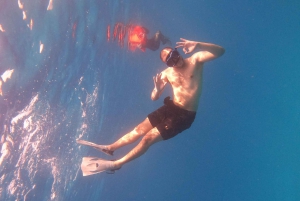 Halve dag snorkelen op de Dimaniyat-eilanden met een mini-jacht