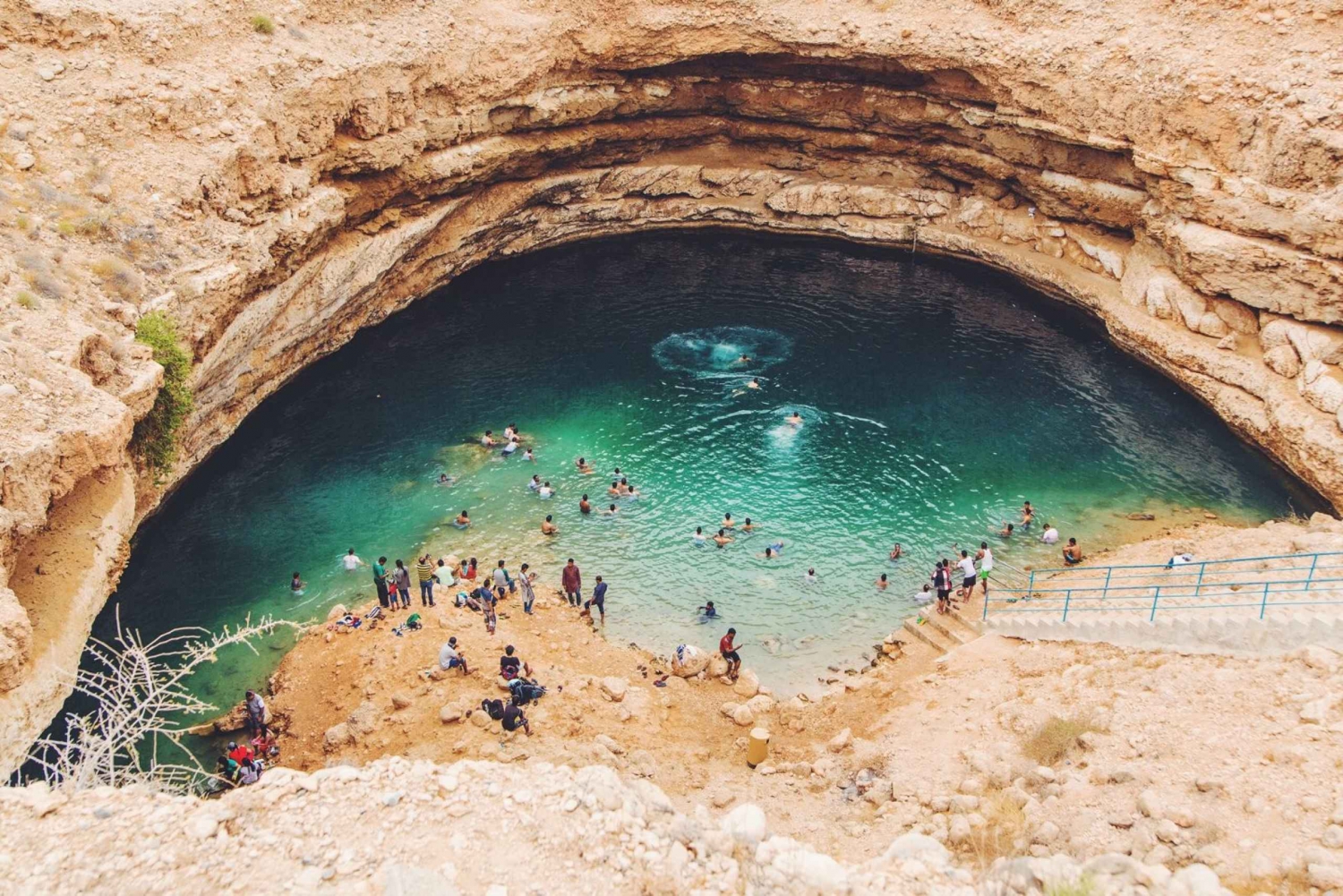 Muscat: Wadi Shab and Bimah Sinkhole Tour with Audio Guide