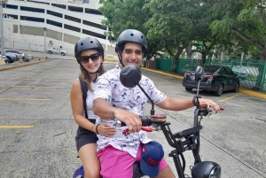 Ave. Balboa: Enjoy the city on a Scooter + drink and Panamanian entrance.