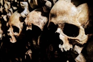 Paris: Catacombs, Audio Guide, and River Cruise Option