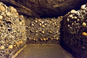 Paris: Catacombs Ticket and Seine River Cruise