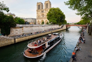 Paris: Evening Cruise with Drink and City Walking Tour