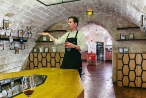 Paris: Les Caves du Louvre Guided Tour with Wine Tastings