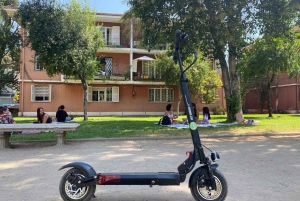 Santiago on an electric scooter. City and nature