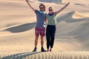 Huacachina: Sandboarding/Sandskiing-upplevelse vid solnedgången på galna buggy